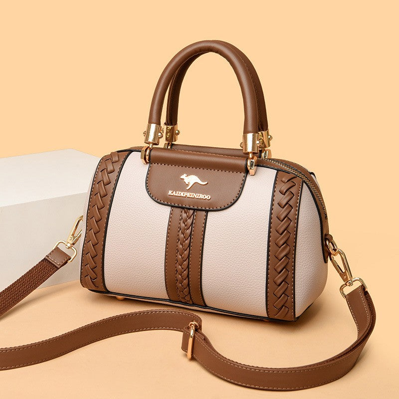 Elegant women's handbag with shoulder strap