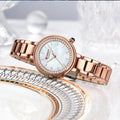 Elegant women's wristwatch with small dial and metal strap