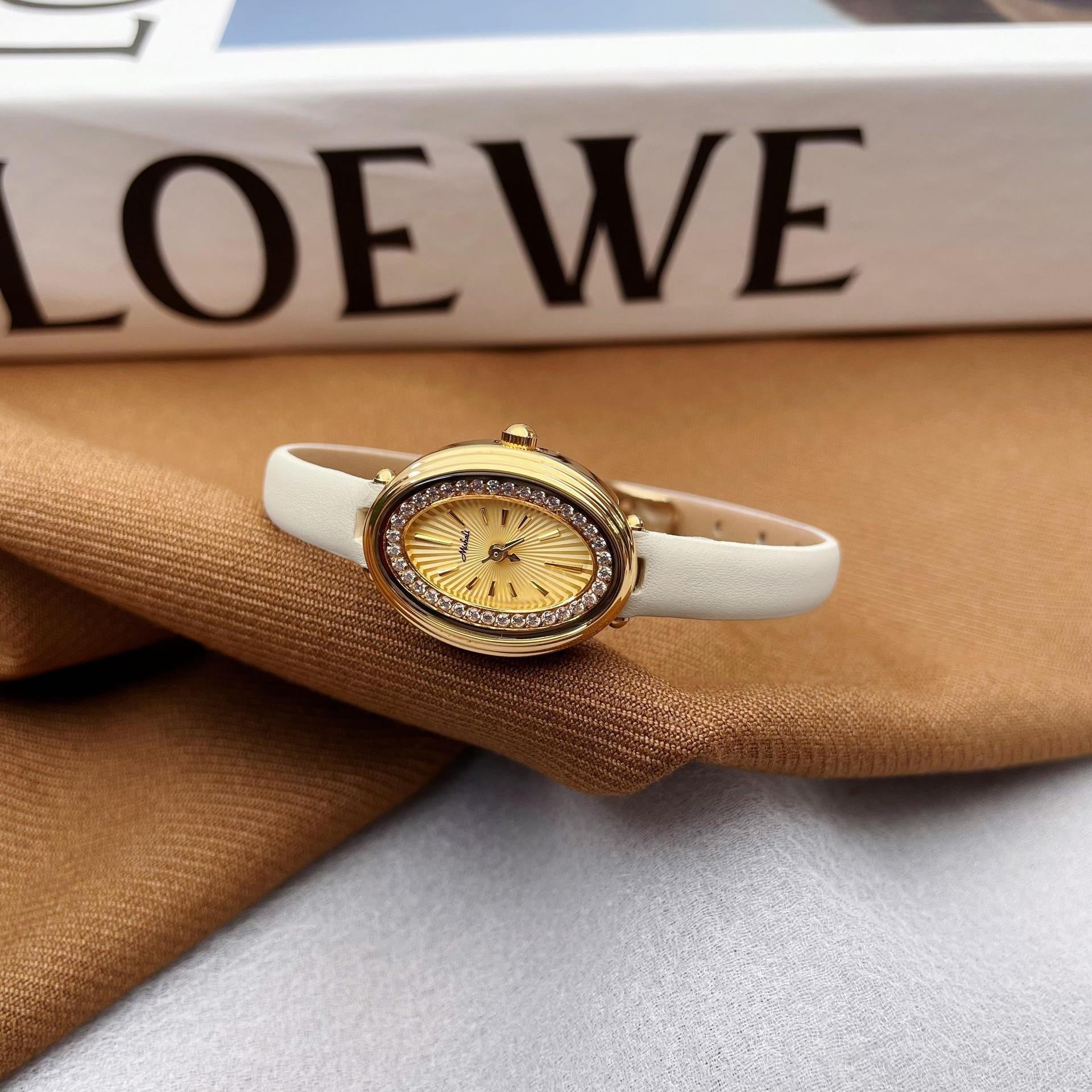 Elegant women's watch – gold & bordeaux
